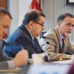 Sen. Peter Micciche, R-Soldotna, right, asks a questionduring a Senate Finance Committee meeting with Lacey Sanders, Budget Director for the Office of Management and Budget, about consolidation of department positions on Monday, Feb. 25, 2019. Sen. Lyman Hoffman, D-Bethel, center, and Sen. Mike Shower, R-Wasilla, left, are also shown. (Michael Penn | Juneau Empire)