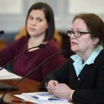 Cheryl Lowenstein, Director of the Division of Administration Services, left, speaks to the Senate Finance Committee with Lacey Sanders, Budget Director for the Office of Management and Budget, consolidation of departments on Monday, Feb. 25, 2019. (Michael Penn | Juneau Empire)