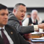 In this file photo, Sen. Mike Shower, R-Wasilla, asks a question as Donna Arduin, Director of the Office of Management and Budget and Mike Barnhill, policy director for the OMB. (Michael Penn | Juneau Empire)