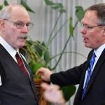 Bruce Tangeman, Commissioner of Revenue, right, speaks with Sen. Bert Stedman, R-Sita, Co-Chair of the Senate Finance Committee, before their committee meeting at the Capitol on Thursday, Feb. 28, 2019. (Michael Penn | Juneau Empire)
