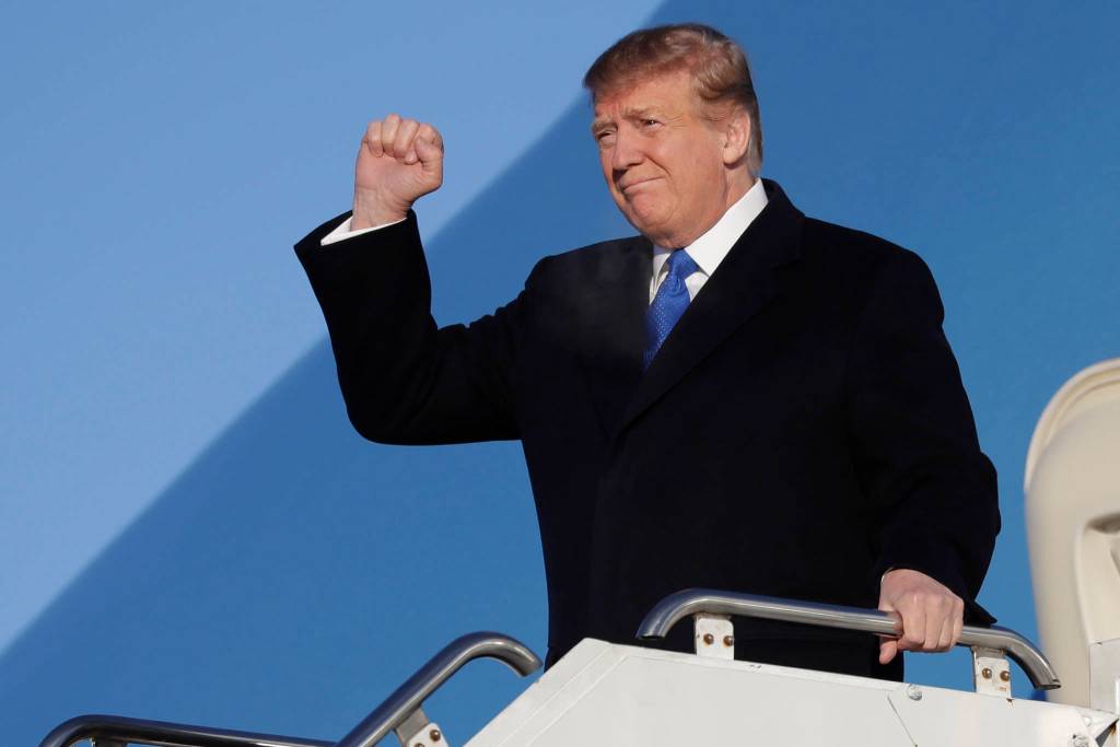 President Donald Trump arrives at Joint Base Elmendorf-Richardson, Thursday, Feb. 28, 2019, in Anchorage, Alaska., during a refueling stop as he returns from Hanoi. (AP Photo/ Evan Vucci)