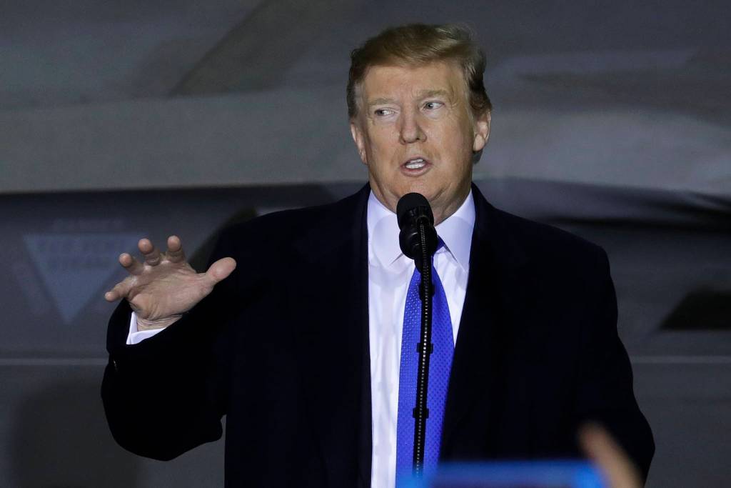 President Donald Trump speaks to service members at Joint Base Elmendorf-Richardson, Thursday, Feb. 28, 2019, in Anchorage, Alaska., during a refueling stop as he returns from Hanoi. (AP Photo/Evan Vucci)