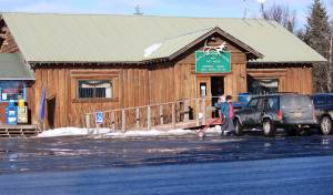 In this Feb. 26, 2019 photo is the Fritz Creek General Store, shown near Homer, Alaska. A cat named Stormy that has spent more than six years as a fixture in a remote Alaska general store is being forced out after officials notified the store owners that the cats presence violates food safety standards. (Megan Pacer | Homer News via AP)