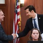 In this February file photo, then-Speaker Pro Tempore Neal Foster, D-Nome, right, shakes hands with newly elected Speaker of the House Bryce Edgmon, D-Dillingham, in the House. (Michael Penn | Juneau Empire)