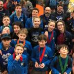The Juneau Tornadoes shows off their medals after competing in the Tanana Invitational, the unofficial middle school state champion meet, on Saturday, March 2, 2019. The Tornadoes placed fourth behind North Pole, Randy Smith (Fairbanks) and Kodiak and had 10 medalists: Brandon Day, Colton Cummins, Evander Elixman (77), Carson Cummins (84), Brycen MacKubbin (98), Eric Tipton (105), Jamal Johnson (140), Sage Richards (148), Thomas Baxter (160), Cailynn Baxter (Girls 97) and Evelyn Richards (Girls 120). (Courtesy Photo | Summer Baxter/Dana Richards)