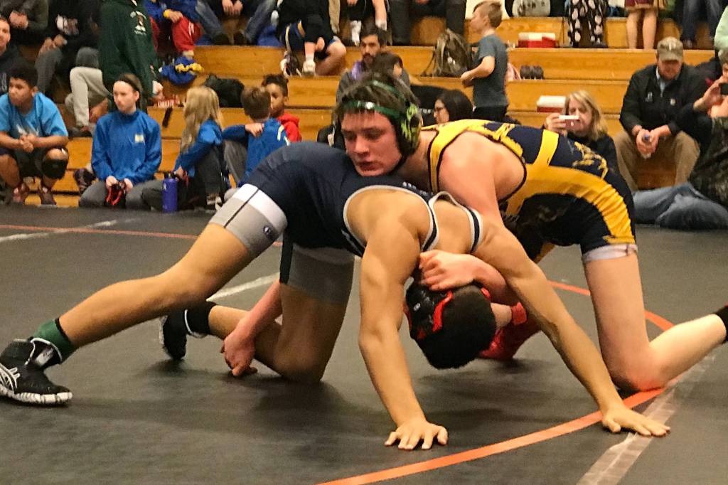 Juneau Tornadoes eighth-grader Sage Johnson wrestles his way to the 148-pound bronze medal at the Tanana Invitational on Saturday, March 2, 2019. Over 400 wrestlers competed at the two-day meet in Fairbanks. (Courtesy Photo | Summer Baxter/Dana Richards)
