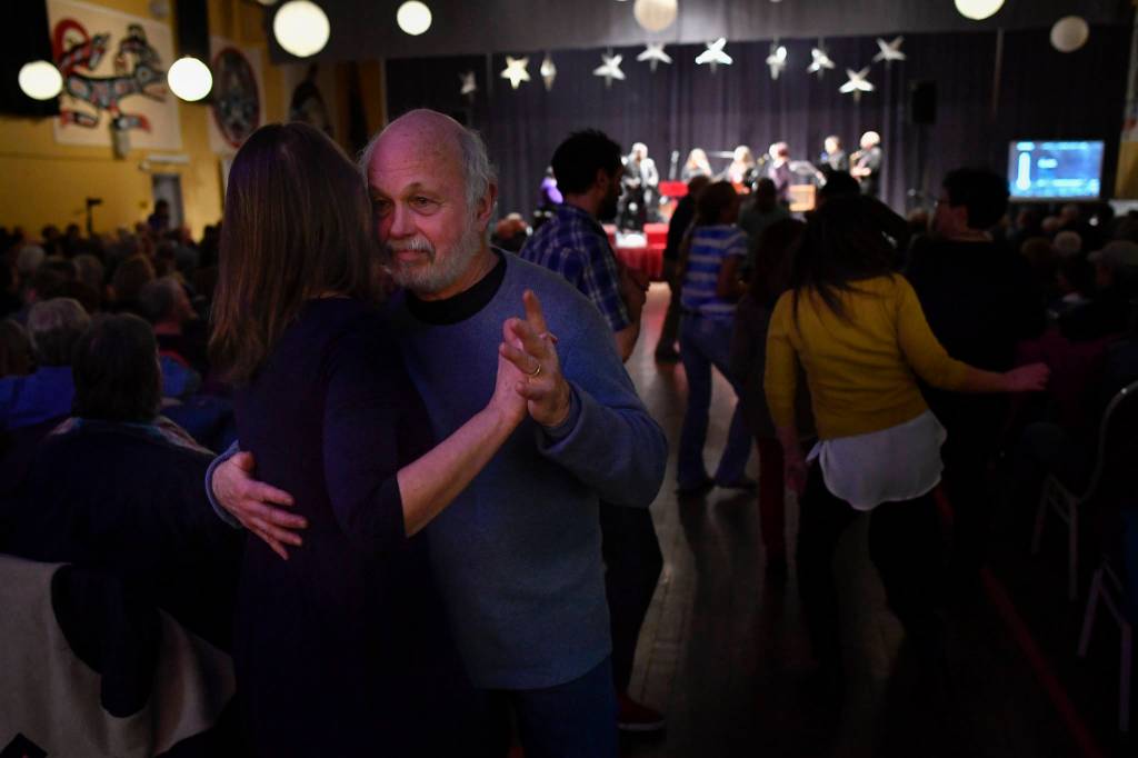 Jim Fowler dances with his wife Susi during the performance of Motown for Our Town featuring Ryan Shaw, Bobby Lewis, Eustace Johnson, Jaunelle Celaire and others at the Juneau Arts & Culture Center on Friday, March 1, 2019. (Michael Penn | Juneau Empire)