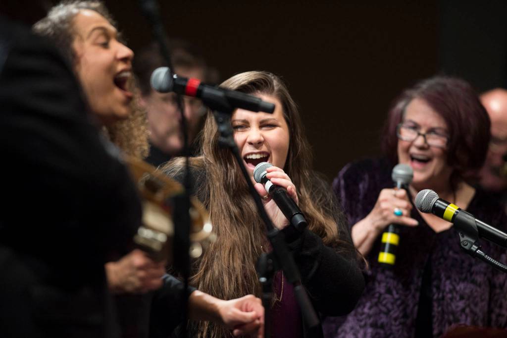 Alyssa Fischer, center, sings during a performance of Motown for Our Town featuring Ryan Shaw, Bobby Lewis, Eustace Johnson, Jaunelle Celaire others at the Juneau Arts & Culture Center on Friday, March 1, 2019. (Michael Penn | Juneau Empire)