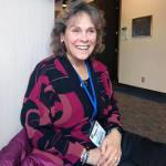Author Annie Boochever smiles at Centennial Hall, Saturday March 2, 2019. The former Juneau resident was in town for a librarians conference. (Ben Hohenstatt | Capital City Weekly)