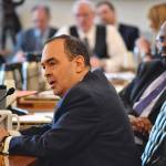 Sen. Donald Olson, D-Golovin, asks Mouhcine Guettabi, Associate Professor of Economics at the Institute of Social and Economic Research at the University of Alaska Anchorage, if Gov. Mike Dunleavys budget proposal will throw Alaska into a depression as Guettabi make his presentation to the Senate Finance Committee at the Capitol on Thursday, March 7, 2019. (Michael Penn | Juneau Empire)