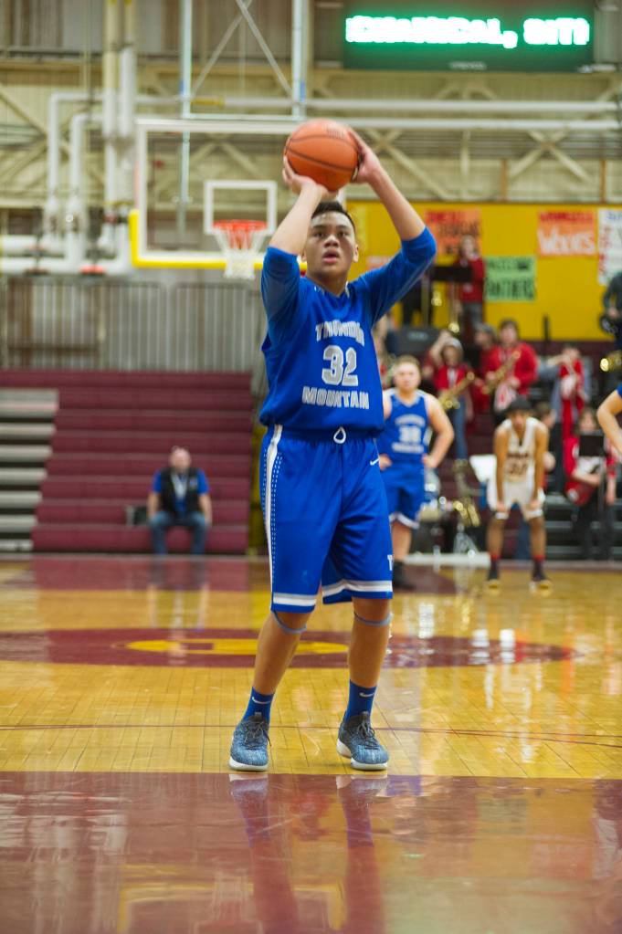 Thunder Mountains Meki Toutaiolepo shoots a free throw in the fourth quarter against Juneau-Douglas in the Region V Basketball Tournament at B.J. McGillis Gymnasium in Sitka on Thursday, March 7, 2019. (Nolin Ainsworth | Juneau Empire)