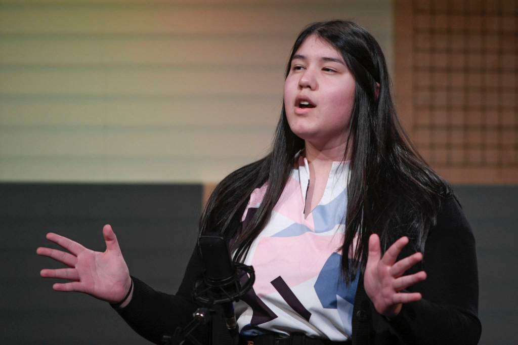 Avery Herrman-Sakamoto of Petersburg High School recites one of her three poems at the annual Poetry Out Loud State Championships held at KTOOs @360 Studio on Thursday, March 7, 2019. (Michael Penn | Juneau Empire)