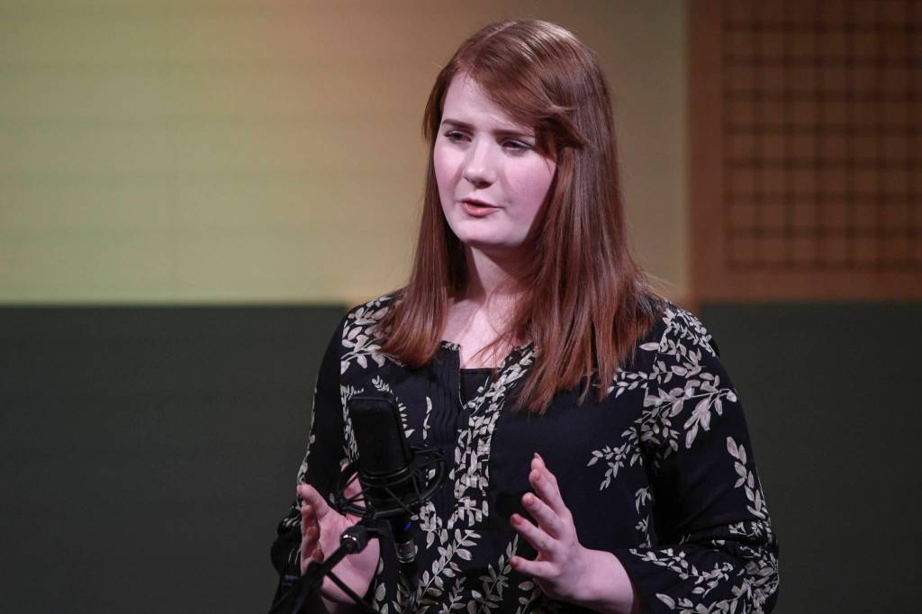 Honor Mealey of North Pole High School recites one of her three poems at the annual Poetry Out Loud State Championships held at KTOOs @360 Studio on Thursday, March 7, 2019. Mealey placed first in the event. (Michael Penn | Juneau Empire)