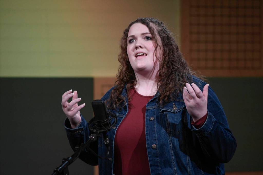 Eliana Zimmerman of Tanalian School in Port Alsworth recites one of her three poems at the annual Poetry Out Loud State Championships held at KTOOs @360 Studio on Thursday, March 7, 2019. (Michael Penn | Juneau Empire)