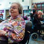 Jeannette McLeod talks about Gov. Mike Dunleavys budget proposal during the Alaska Pioneer Homes weekly ice cream social on Friday, March 8, 2019. (Michael Penn | Juneau Empire)