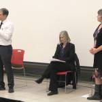 Sen. Jesse Kiehl, D-Juneau, speaks while Reps. Andi Story, center, and Sara Hannan listen at a town hall meeting on Tuesday at Juneau-Douglas High School. (Alex McCarthy | Juneau Empire)