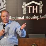 Scott Ciambor, chief housing gfficer for the City and Borough of Juneau and board chair for the Alaska Coalition on Housing and Homelessness, speaks at the Southeast Housing Summit at the Baranof Hotel on Wednesday, March 13, 2019. The summit is a two-day program organized by the Tlingit and Haida Regional Housing Authority. (Michael Penn | Juneau Empire)