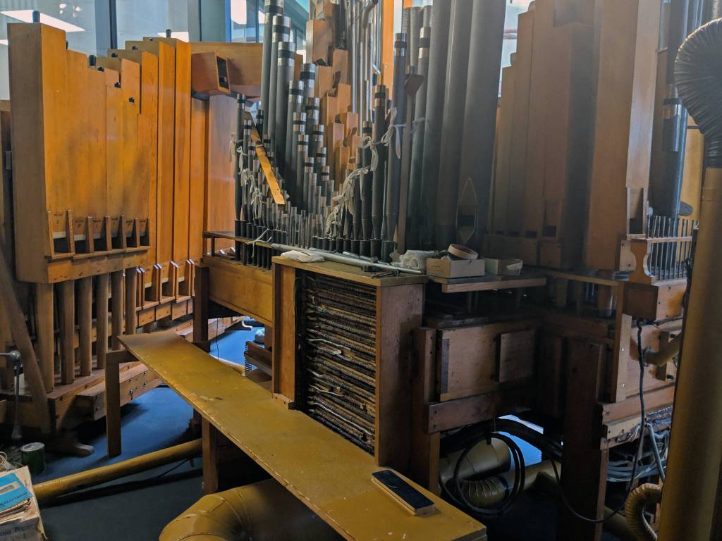 The view from inside the glass display that houses the Kimball pipe organs pipes show the engineering that went into the 20th century instrument. (Ben Hohenstatt | Capital City Weekly)