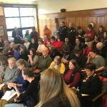 Members of the public wait to share their thoughts on the governors budget to the House Finance Committee at the Alaska State Capitol on Friday, March 22, 2019. (Alex McCarthy | Juneau Empire)