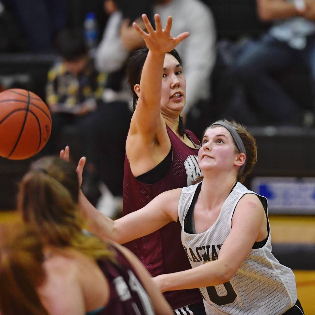 Skagways Kaylie Smith, right, shoots against Haines Fran Daly in the womens final at the Gold Medal Basketball Tournament on Saturday, March 23, 2019. (Michael Penn | Juneau Empire)