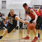 Kakes Nick Davis, right, takes the ball away from Klukwans Pete Dohrn in the Masters final at the Gold Medal Basketball Tournament on Saturday, March 23, 2019. (Michael Penn | Juneau Empire)