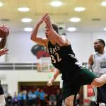 Haines Tyler Swinton, center, reacts after Angoons Dominique Brinson stripped him of the ball in the B final at the Gold Medal Basketball Tournament on Saturday, March 23, 2019. Haines won 88-80. (Michael Penn | Juneau Empire)