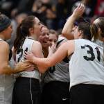 Skagway gather to celebrate their win over Haines in the womens final at the Gold Medal Basketball Tournament on Saturday, March 23, 2019. Skagway won 58-49. (Michael Penn | Juneau Empire)