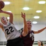 Skagways Jesse Ellis, left, beats Haines Alisa Beske to a rebound in the womens final at the Gold Medal Basketball Tournament on Saturday, March 23, 2019. Skagway won 58-49. (Michael Penn | Juneau Empire)