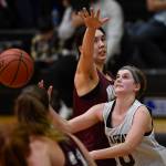 Skagways Kaylie Smith, right, shoots against Haines Fran Daly in the womens final at the Gold Medal Basketball Tournament on Saturday, March 23, 2019. (Michael Penn | Juneau Empire)