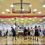 Klukwans Jason Shull shoots under the basket against Hydaburg in the C final at the Gold Medal Basketball Tournament on Saturday, March 23, 2019. Hydaburg won 93-81. (Michael Penn | Juneau Empire)