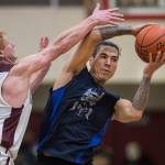 Klukwans Jesse McGraw, left, pressures Hydaburgs TJ Young in the C final at the Gold Medal Basketball Tournament on Saturday, March 23, 2019. Hydaburg won 93-81. Young won the MVP award. (Michael Penn | Juneau Empire)