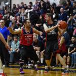 Kakes Rudy Bean defends against Klukwans Dave Buss in the Masters final at the Gold Medal Basketball Tournament on Saturday, March 23, 2019. Kake won 75-64. (Michael Penn | Juneau Empire)