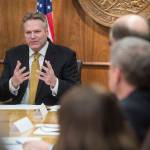 In this Jan. 8, 2019 photo, Gov. Mike Dunleavy meets with his cabinet members and gives attending media a list of his administrations priorities at the Capitol. (Michael Penn | Juneau Empire File)