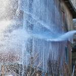 Firefighters knock down the last flames of a house fire on North Douglas Highway on Thursday, March 29, 2019. (Michael Penn | Juneau Empire)