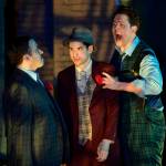 James Sullivan, left, as Nathan Detroit faces some heat from Felix Thillet, middle, as Harry the Horse and Evan Carson, right, as Big Jule during a performance of Guys and Dolls at Perseverance Theatre on Thursday, March 14, 2019. (Michael Penn | Juneau Empire)