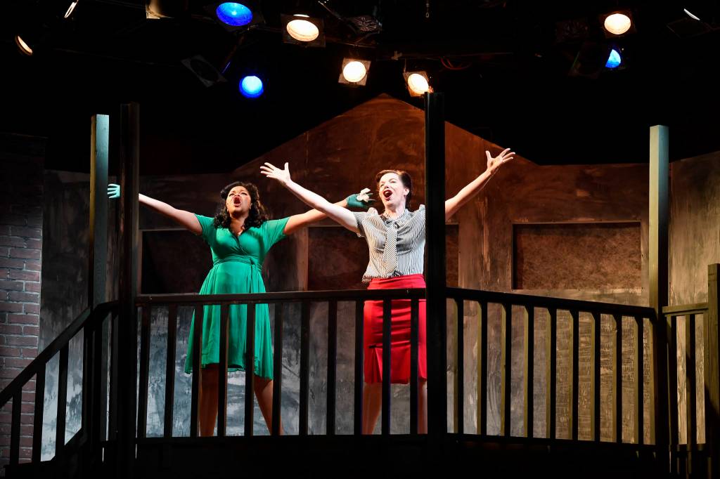 Ericka Lee and Adelaide and Allison Holtkamp as Sarah Brown sing during a performance of Guys and Dolls at Perseverance Theatre on Thursday, March 14, 2019. (Michael Penn | Juneau Empire)