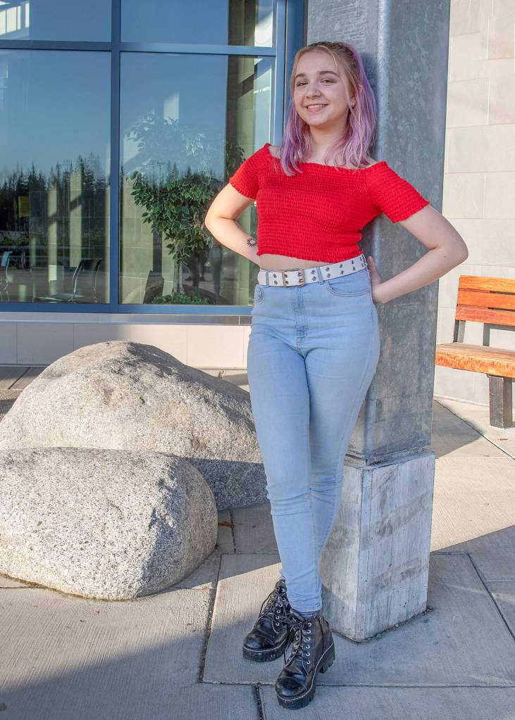 April 28, 2019: Caro Schultheis, a Juneau-Gastineau Rotary Club exchange student, hails from Buenos Aires, Argentina. She brings a trendy and fashionable style to Juneau with her. This day she wore a red off-the-shoulder crop top from Ona Saez, high-rise skinny jeans from Forever 21, a white faux leather belt and bold, black leather lace-up boots. Her finishing touch  streaks in her hair courtesy of Arctic Fox, purple rain.