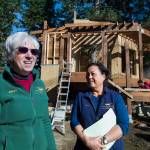 Juneau Raptor Center board members Janet Capito, left, and Dale Cotton, talk about construction on a new education display on Mount Roberts on Thursday, March 28, 2019. The display will house Lady Baltimore, an adult bald eagle that is not releasable back to the wild. (Michael Penn | Juneau Empire)