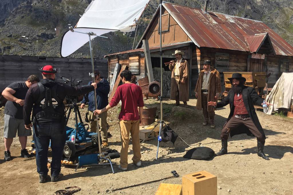 Sound guy Jeremy Blake and director of photography Mackenzie Banbury ready equipment to film Ted Carney, David Fink and Joseph LeCompte during the making of Sudsy Smith Rides Again. (Courtesy Photo | For Chad Carpenter)