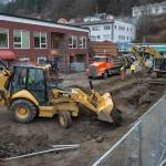 A crew from Arete Construction works on a now closed Ferry Way on Wednesday, March 13, 2019. The construction is phase three in the downtown street and sidewalk remodel and is expected to be completed by early May. (Michael Penn | Juneau Empire)