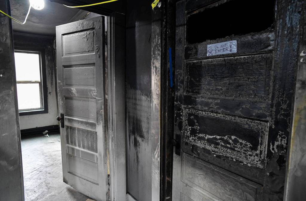 Ernestine Hayes gives a tour of her fire-damaged house at the corner of 5th and Franklin Street on Wednesday, April 3, 2019. (Michael Penn | Juneau Empire)