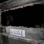Ernestine Hayes gives a tour of her fire-damaged house at the corner of 5th and Franklin Street on Wednesday, April 3, 2019. (Michael Penn | Juneau Empire)