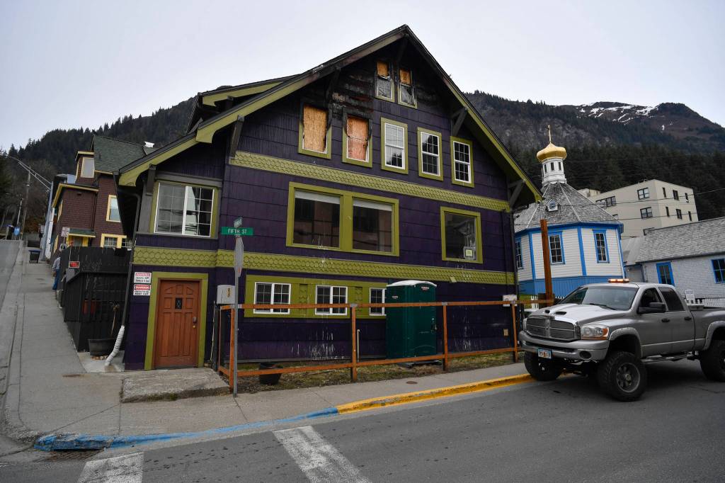 Ernestine Hayes gives a tour of her fire-damaged house at the corner of 5th and Franklin Street on Wednesday, April 3, 2019. (Michael Penn | Juneau Empire)