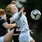 Thunder Mountains Emily Heaton, right, controls the ball against Juneau-Douglas Nikki Box at Adair-Kennedy Memorial Field on Wednesday, April 3, 2019. JDHS won 8-0. (Michael Penn | Juneau Empire)