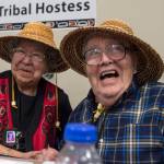 Tribal Hostess Bertha Karras, of Sitka, left, and Tribal Host Fred Hamilton Sr., of Craig, share a laugh at the 83rd Annual Tribal Assembly of the Central Council of the Tlingit and Haida Indian Tribes of Alaska at Elizabeth Peratrovich Hall on Wednesday, April 18, 2018. (Michael Penn | Juneau Empire File)