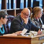 Rep. Andy Josephson, D-Anchorage, second from left, listens to Rep. Kelly Merrick, R-Eagle River, as she reads an amendment to repeal the Ocean Ranger program during a House Finance Committee meeting at the Capitol on Thursday, April 4, 2019. The Ocean Ranger program was approved through a voter ballot initiative in 2006. The amendment passed 8-3. (Michael Penn | Juneau Empire)