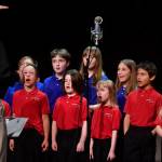 Members of the Alaska Youth Choir perform at the 45th annual Alaska Folk Festival at Centennial Hall on Monday, April 8, 2019. (Michael Penn | Juneau Empire)