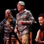 Tim Triggs, Zane Jones and Nate Wiley of the Wileys Coyotes, of Boulder, Colorado, perform at the 45th annual Alaska Folk Festival at Centennial Hall on Monday, April 8, 2019. (Michael Penn | Juneau Empire)