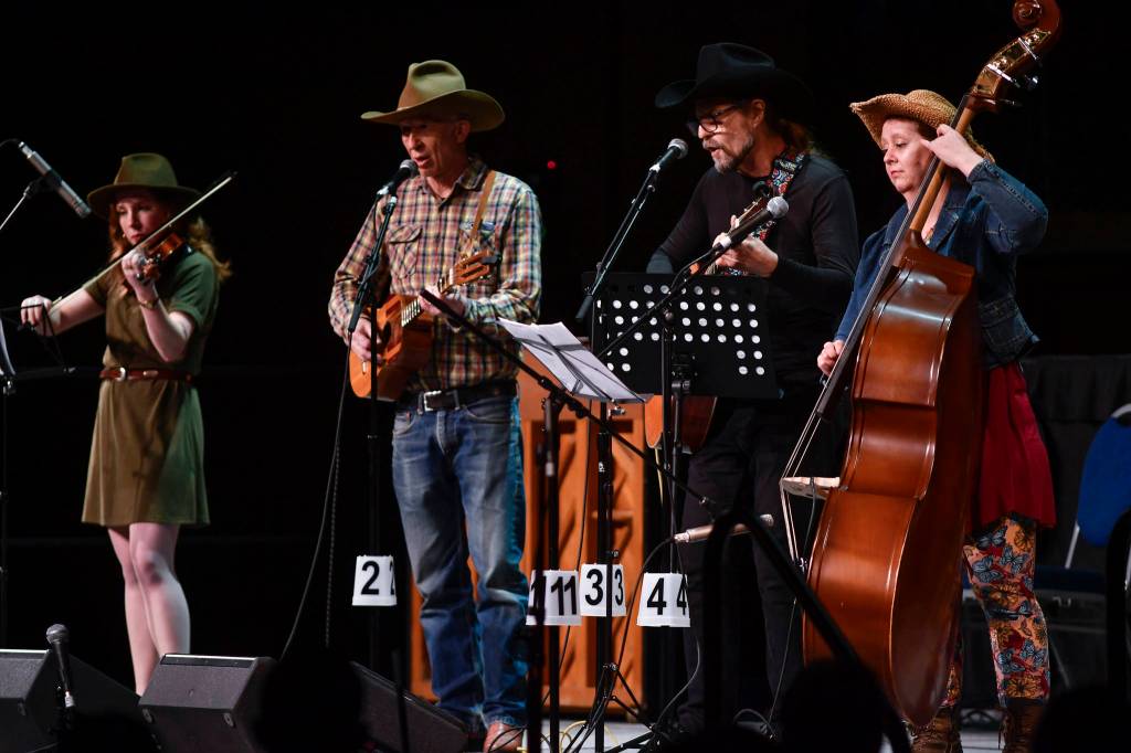 Lost on C, of Juneau, perform at the 45th annual Alaska Folk Festival at Centennial Hall on Monday, April 8, 2019. (Michael Penn | Juneau Empire)