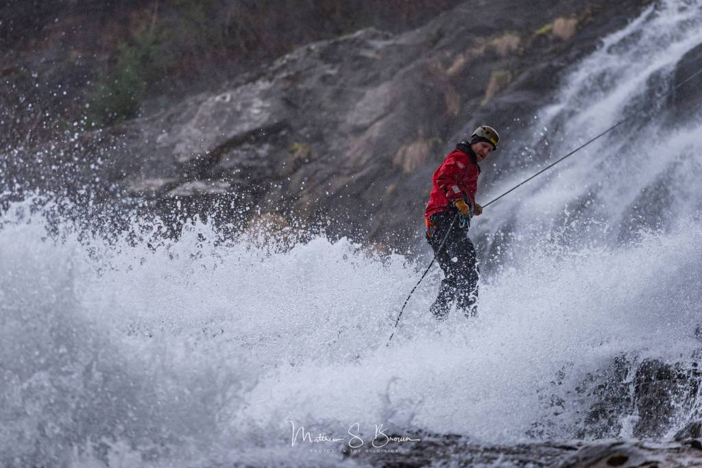 Greg Taylor rappels off Nugget Falls in Juneau on April 6, 2019. (Courtesy Photo | Matthew Brown)